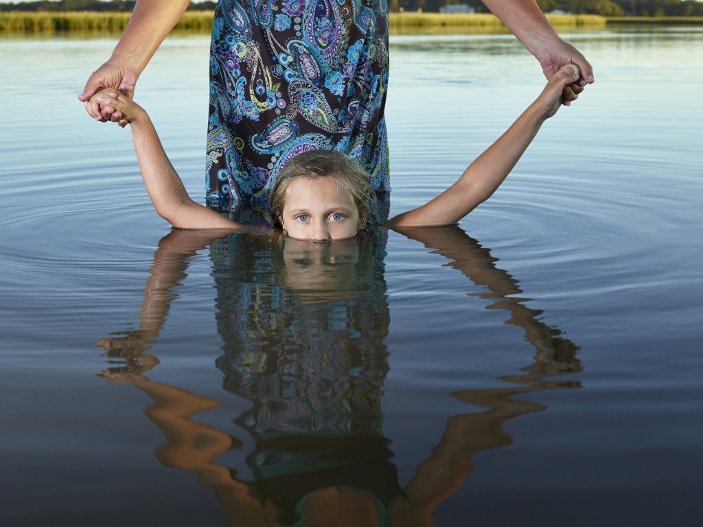 2016 September 23. Brock Environmental Center, Virginia Beach, Virginia. Sea level rise photo shoot with local children. Laurie Carroll Sorabella with daughter Haven Carroll.